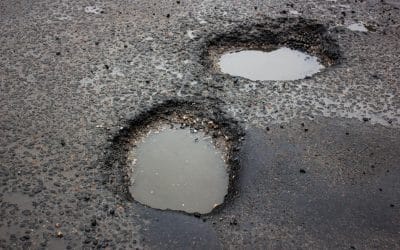 7 Common Causes of Asphalt Potholes & How to Prevent Them
